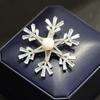 Elegante Broche de Copo de Nieve Giratorio de Doble Capa con Circonitas Microincrustadas de Lujo Ligero Elegante Pin con Sensación de Alta Gama para Mujer