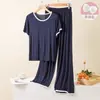 2026 Nuevo Modelo 8 Colores Color Sólido con Copas Acolchadas Dulce Casual Manga Corta Shorts Conjunto de Pijama de Verano para Mujer Ropa de Casa