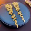 Pendientes Largos con Borlas de Flor y Hoja Metálicas de Alta Gama Europeos y Americanos, Moda Transfronteriza, Elegantes, de Nicho, Personalizados para Mujer
