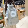 Nova Mochila de Urso de Grande Capacidade para Aluno do Ensino Médio Bolsa Escolar Menina ins Alta Aparência Moda Casual Mochila Leve