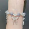 Pulsera elegante con diseño de mariposa pequeña y de alto valor de color, con diseño de viajero en el tiempo y el espacio, alrededor de Ye Xuan.