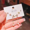 Verano nuevo chapado en oro real exquisitos tres pares de aretes pequeños de alto sentido pequeños frescos dulces aretes de temperamento combinables