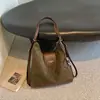 2026 Bolso Nuevo Versátil para Salir y Viajar de un Solo Hombro Cruzado Bolso de Mano para Mujer Otoño Invierno Gran Capacidad Esmerilado Empalmado Bolso de Axila