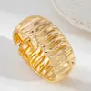 Europa y Estados Unidos joyería transfronteriza ins personalidad flor retorcida onda de agua resorte pulsera moda nudo liso pulsera de resorte