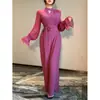 Moda europea y americana transfronteriza para mujer 2025 primavera/otoño elegante mono de color liso con mangas largas acampanadas y cuello redondo de pierna ancha