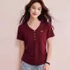Roupas Brancas Femininas 2026 Verão Novo Design Gola V Bainha Irregular Curva Estilo Coreano Manga Curta Camiseta para Mulheres