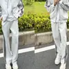 Outono 2026 Conjunto de Duas Peças com Capuz e Zíper Três Listras Masculino e Feminino Luxo Leve Estilo de Rua Conjunto Casual de Moda