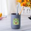 Pegatinas de rana pequeña de viento lindas transfronterizas 50 pegatinas de decoración impermeables para taza de teléfono móvil pegatinas para cuenta a mano de niños al por mayor