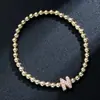 Pulsera elástica para mujer Amazon Transfronteriza Moda Letra Simple Cobre Incrustado con Circonita y Cuentas Uvccb