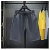 Comercio exterior al por mayor nuevos pantalones de seda helada para hombre verano pantalones de color liso shorts pijamas ajustados pantalones grandes
