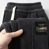 Calça masculina casual de veludo cotelê, folgada, plus size, calça esportiva masculina, calça grossa forrada com fleece para outono e inverno