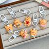 Llavero con forma de oso de mantequilla, colgante para bolso, pequeño accesorio de regalo, llavero para mochila escolar, accesorios para pareja, bonito