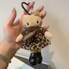 Bolsa Colgante Hello Kitty Piernas Largas Fragancia Ligera Muñeca de Peluche Dibujos Animados Lindo Llavero de Corazón Colgante de Regalo