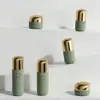 Qianyi Nuevo Modelo 30ml Loción Esencia Botella Cosmética de Vidrio con Tapa Electroplateada, Envase para Botella de Crema Líquida con Tapa Dorada, Botella Mate