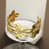 Pulsera de Flor Geométrica Exagerada Creativa de Apertura Nueva Moda Transfronteriza Europea y Americana Flor de Mosaico Oro Hierro Pieza de Mano para Mujer