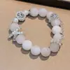 Pulseira de pérolas nicho alto senso temperamento doce menina pulseira personalidade atacado 2024 nova joia net red