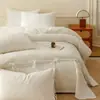 Juego de cuatro piezas de jacquard blanco puro sin teñir para hotel de estancia en casa de alta gama, sábana bajera de algodón puro, sábana encimera, funda de edredón juego de tres piezas