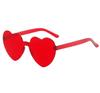 Gafas de sol con forma de corazón de melocotón gelatina para mujer sin montura una pieza Gafas marinas gafas de amor gafas lindas divertidas venta al por mayor