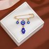 Olhos europeus e americanos altura da cintura suéter azul de alta qualidade vento frio alfinete criativo diamante olho de demônio franja broche