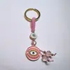 Colgante de Serie Ojo de Diablo Transfronterizo Europeo y Americano Colgante de Llavero de Joyería de Animales Ojo de Hueso con Goteo de Aceite Accesorios de Aleación para Mujeres