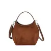 Bolsa de camurça estilo balde com design de nicho coreano para mulheres, nova coleção outono/inverno 2026, bolsa de ombro/transversal de alta qualidade