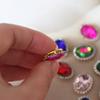Gema de cristal de colores ovalada de 13 x 18 mm para hacer tú mismo, para ropa, sombreros, bufandas, decorativa, con garras y base dorada.