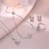 Collar para Mujer Estilo Coreano y Japonés Collar de Circonita de Flor Giratoria Transfronterizo Nicho Ins Aretes Set de Moda Cadena Clavicular