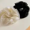Goma para el pelo fruncida estilo perezoso chic francés para mujer, accesorio versátil y de alta gama para coletas bajas y moños.