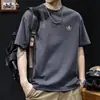 Camiseta Estampada de Marca Tendência Manga Curta para Homens, Tamanho Grande Solta Roupa Novo Estilo Verão 2026, Camiseta Masculina Versátil de Alta Qualidade