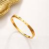 Pulseira de aço titânio numeral romano mulheres não desbotam fabricantes atacado pulseira da moda banhada a ouro 18K joias de alto senso
