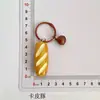 Chaveiro de Pão de Fermentação Natural Brinquedo de Comida Simulada Croissant Baguete Rosquinha Argola de Chaveiro Sino Pingente para Mochila Acessório