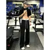 Pantalones deportivos tipo color block estilo americano para hombre, colección otoño 2026, con un diseño audaz y curvo, corte recto y estilo casual versátil