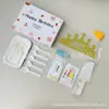 Conjunto de acessórios para bolo Fábrica Ningjin conjunto de sete peças em caixa velas de aniversário chapéu de coroa faca garfo prato de plástico descartável