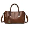 Outono 2026 Novo Estilo Bolsa Feminina Transfronteiriça Bolsa para Mulheres de Meia-idade Bolsa de Ombro Prática Bolsa Transversal Simples Bolsa de Mão para Sogra Mãe