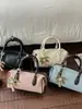 2026 Otoño Nuevo Estilo Coreano Retro Bolso de Hombro de Moda Más Vendido Color Sólido para Viajes Diarios Bolso Cruzado Tipo Cubo