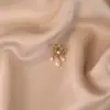 Broche novo estilo feminino senso de alta qualidade nicho broche atacado pino de alta qualidade temperamento fixo roupas terno joia pérola