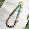 Cordón trenzado original para teléfono, nuevo estilo chino, cadena para teléfono con cuentas de sándalo estilo nacional, accesorio de nicho retro de alta gama para hombres y mujeres
