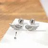 Nuevo Estilo Dulce-Cool Alas de Ángel Doble Espiral Perforación para Cartílago de la Oreja para Mujeres, Moda Personalizada Acero de Titanio de Alta Gama Perforación para Lóbulo de la Oreja