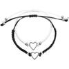 Nuevo par transfronterizo de cuerda de mano tejida de amor hueco blanco y negro simple para todo, pulsera magnética para pareja de larga distancia