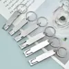 Venta al por mayor de fábrica cortaúñas plegables de acero inoxidable tamaño grande mediano pequeño herramientas para uñas de pedicura exfoliantes
