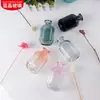 Processamento de frasco de aroma de vidro personalizado frasco de aroma de vidro colorido em degradê pequeno recipiente de fragrância de rattan ornamentos de quarto