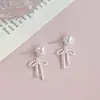2026 Nuevos Pendientes de Perlas con Colgante de Flor con Goteo de Aceite Dulce, con un Toque de Lujo, Personalizados, Modernos, Versátiles
