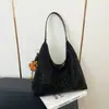 Bolso tote de ante de un solo hombro, bolso casual de cuero suave de gran capacidad para mujer, nuevo bolso versátil para axila de otoño e invierno 2026 para mujer