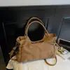 Bolsa de Motocicleta de Mano Estilo Wasteland Coreano para Mujer Nueva Tendencia Otoño/Invierno 2025 Bolso Tote Gran Capacidad para Viajar Bolso de Hombro Único