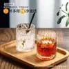 Conjunto de copos de vidro resistentes ao calor para uso doméstico, apresentando um design simples, moderno e elegante, incluindo copos de vidro, copos de água e taças de vinho, todos em cor transparente