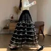 Falda de pastel de malla de alta gama en capas, nuevo estilo otoño/invierno, cintura alta elástica, fluida, línea A de hadas, falda larga en capas
