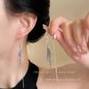 Pendientes de borlas de perlas y flores doradas para mujer, elegantes, ligeros, de lujo, de alta gama, con un toque europeo y americano, con caras exageradas.