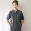 Konsaini 100% cachemira pura de manga corta para mujer otoño e invierno 2026 cuello camisero botón dorado camiseta de punto top tipo polo para ir al trabajo