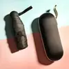 Sombrilla Plegable de Cápsula Protección Solar Protección UV Sombrilla para Mujer Doble Uso Sol y Lluvia Sombrilla Parasol Ultra-ligera Cinco Pliegues Bolsillo Pequeño