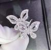 He Cheng Deseo Anillos para Mujer de Venta Caliente Europeos y Americanos Nuevos de Diamante Completo Dos Mariposas Chapados en Oro Blanco Exquisitos y Brillantes